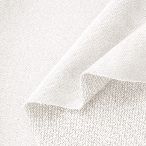 Off-white peach skin sweatshirt knit – close-up of loopback texture and soft surface