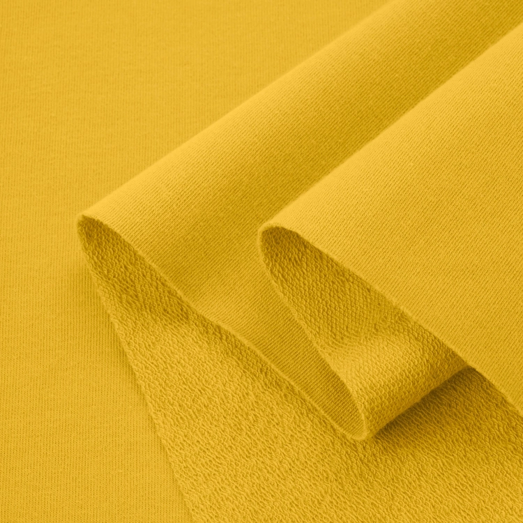 Dresówka pętelka bawełna 280g żółta – złożony materiał z wyraźną pętelkową stroną
