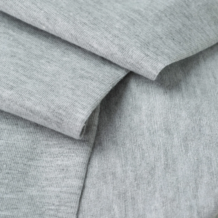 Merceryzowana dzianina Single Jersey Bawełna 160g w kolorze melanż szary – układ tkaniny podkreślający fakturę materiału