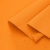 Folds of orange fabric – medium-weight material ideal for sweatshirts and pants