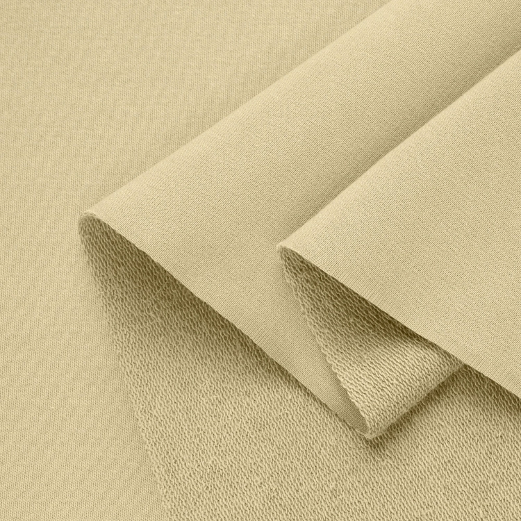 Folds of yellow fabric – medium-weight material ideal for sportswear.