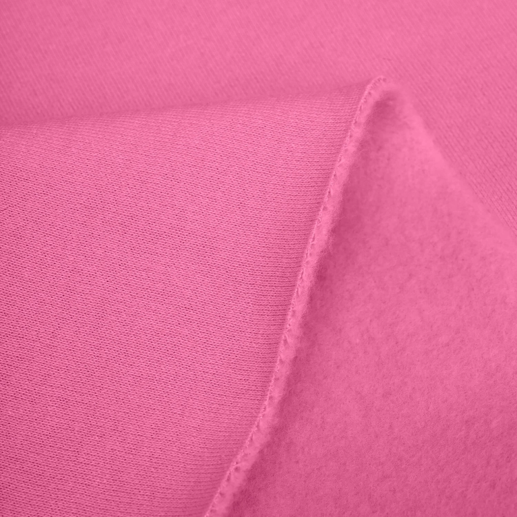 Surface detail of knit fabric in Pink 51 – vibrant, stretchy, and dense cotton blend