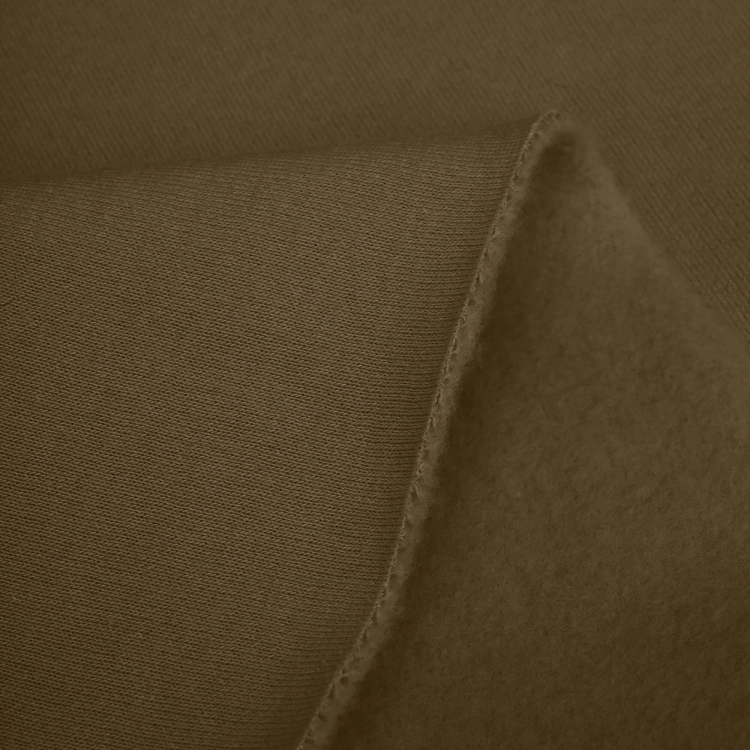 Surface detail of Green 557 knit fabric – smooth cotton blend in earthy green