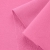 Close-up of Pink 51 cotton knit – smooth right side with visible loopback texture underneath.