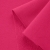 Close-up of Pink 25 fabric – smooth front side and textured loopback reverse in bold pink.