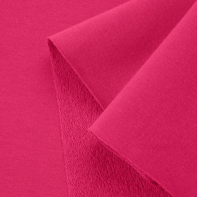 Close-up of Pink 25 fabric – smooth front side and textured loopback reverse in bold pink.