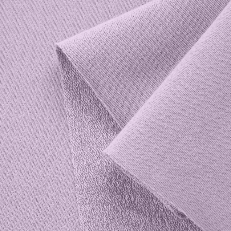 Close-up of Violet 223 knit fabric showing smooth front and textured loopback side.
