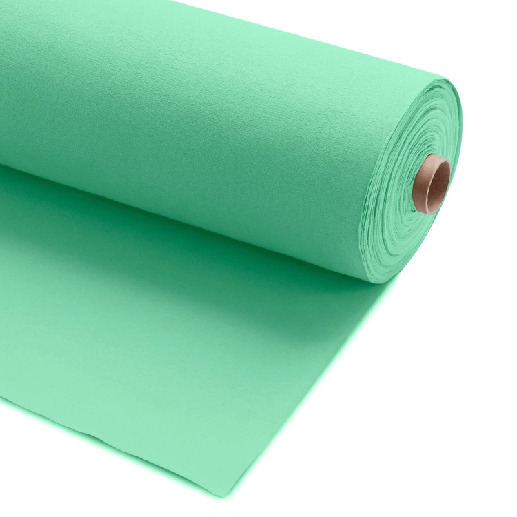 Roll of loopback cotton knit Green 573 – pastel mint green fabric.
