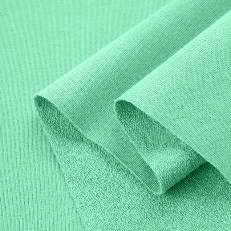 Folded loopback sweatshirt knit Green 573 – soft and stretchy cotton fabric.