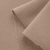 Close-up of Beige 558 loopback fabric – smooth right side with textured terry loops on the reverse.