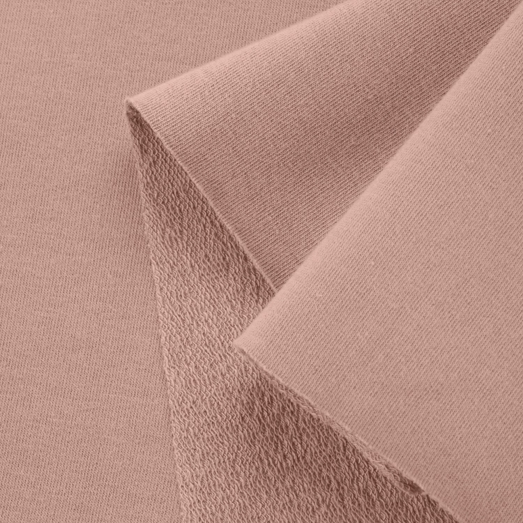 Close-up of Beige 553 – visible loopback texture and smooth front surface.