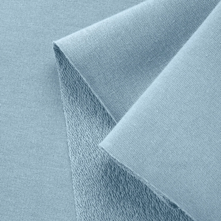 Close-up of Blue 564 knit – smooth front and textured terry back.