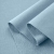 Folded Blue 564 fabric – soft, elastic cotton in a calm, cool hue.