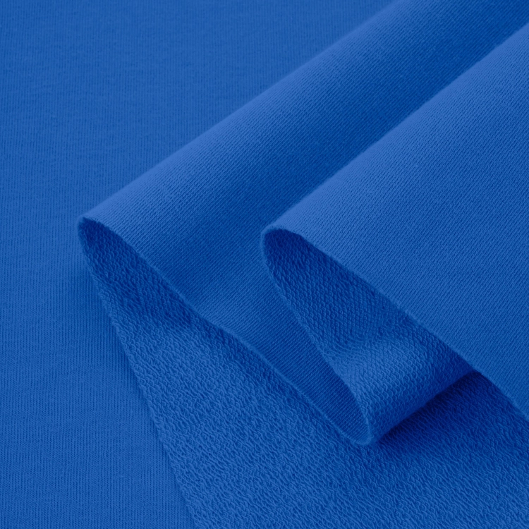 Folded Navy 354 fabric – soft, stretchy cotton in elegant navy tone.
