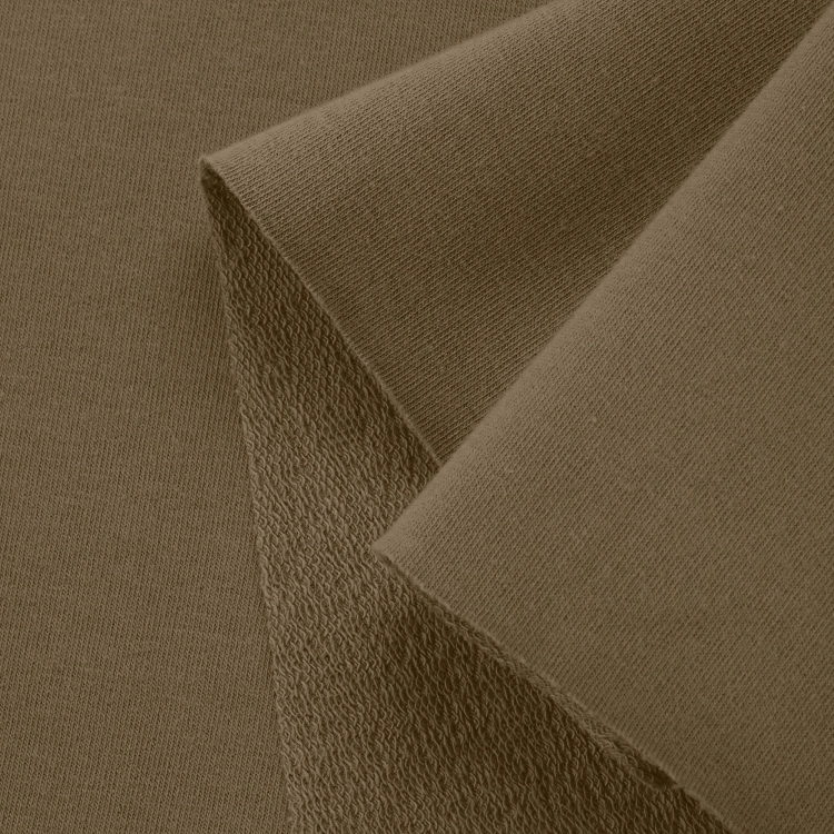 Close-up of Green 557 – smooth surface and looped terry underside.