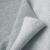 Folded Melange Grey fabric – breathable and flexible terry knit for modern basics.