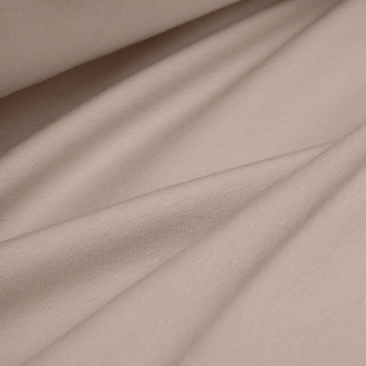 Draped pink jersey fabric – lightweight, stretchy and soft cotton knit.