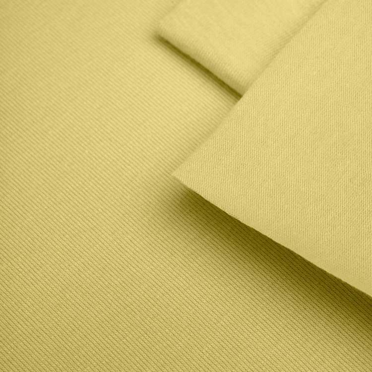 Close-up of Yellow 364 fabric – clean knit texture in a vivid yellow shade.