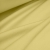 Draped yellow jersey fabric – elastic and airy cotton perfect for summer garments.