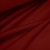 Folds of Bordo 266 fabric – soft, stretchy fabric in a warm, elegant red tone.