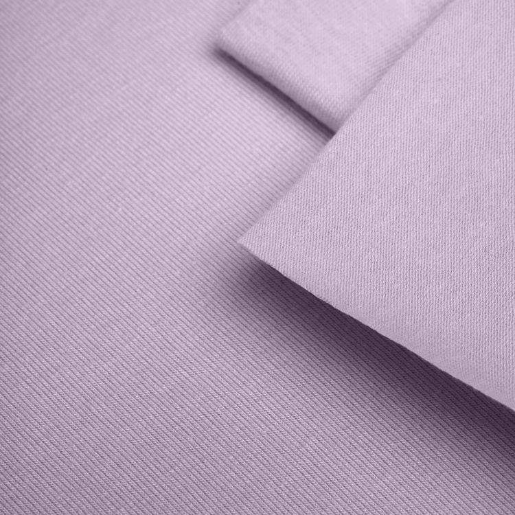 Close-up of Violet 223 fabric texture – smooth single jersey in a lavender shade.