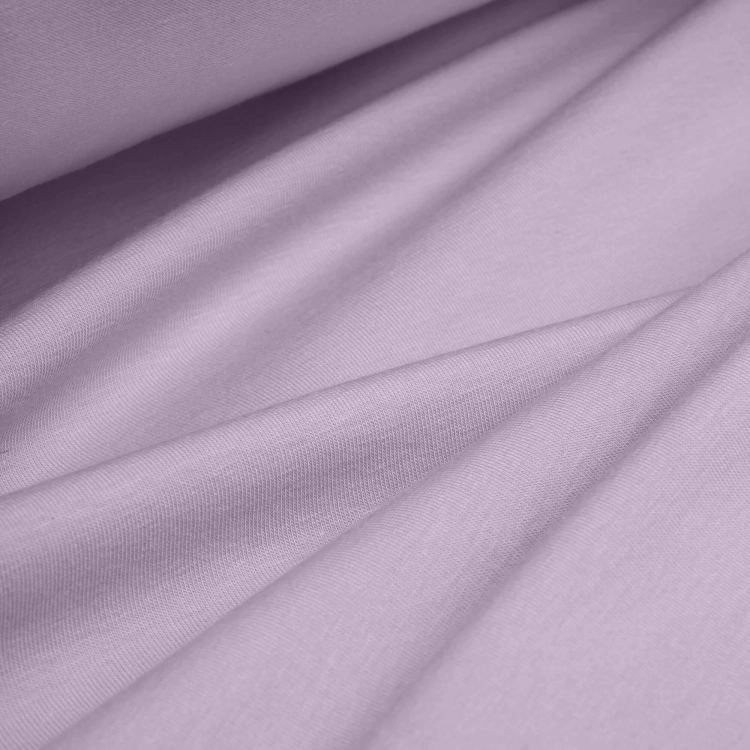 Folds of Violet 223 fabric – light and flexible fabric in a cool, muted violet tone.