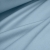Draped folds of Blue 564 fabric – soft, stretchy knit in a dusty blue tone, ideal for comfortable clothing.