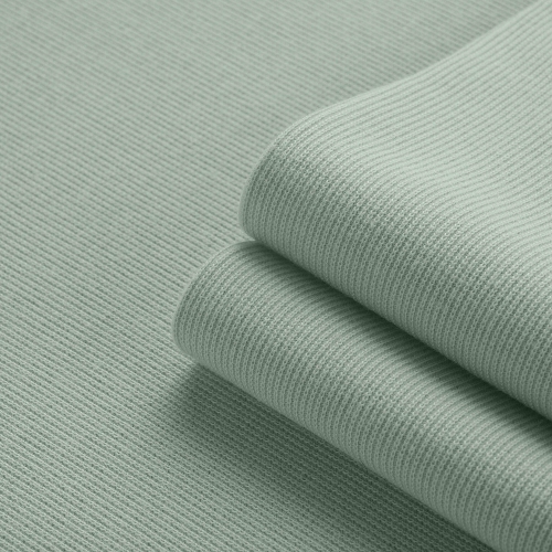 Rib knit with elastane – top view of mint green fabric texture