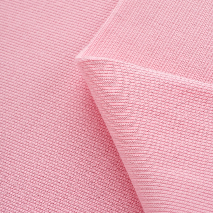 Ribbed knit in pink – detailed structure of stretchy cotton fabric