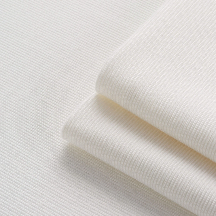 Close-up of off white ribbed knit texture