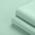 Close-up of green ribbed knit fabric texture