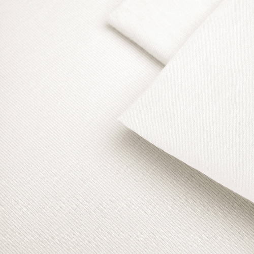 Zbliżenie na strukturę dzianiny Off White 9 – gładki splot single jersey z bawełny organicznej.