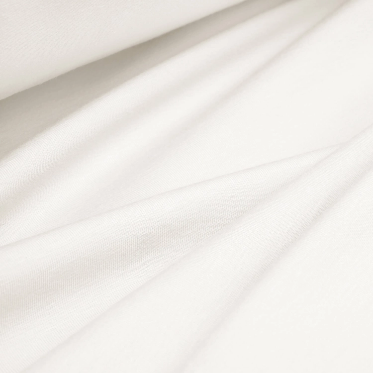Dzianina off white 9 – ułożony materiał ukazujący elastyczność i miękkość